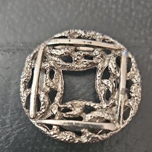 Vintage silver tone brutalist abstract scarf clip Silver Ornate Round Brooch 80s